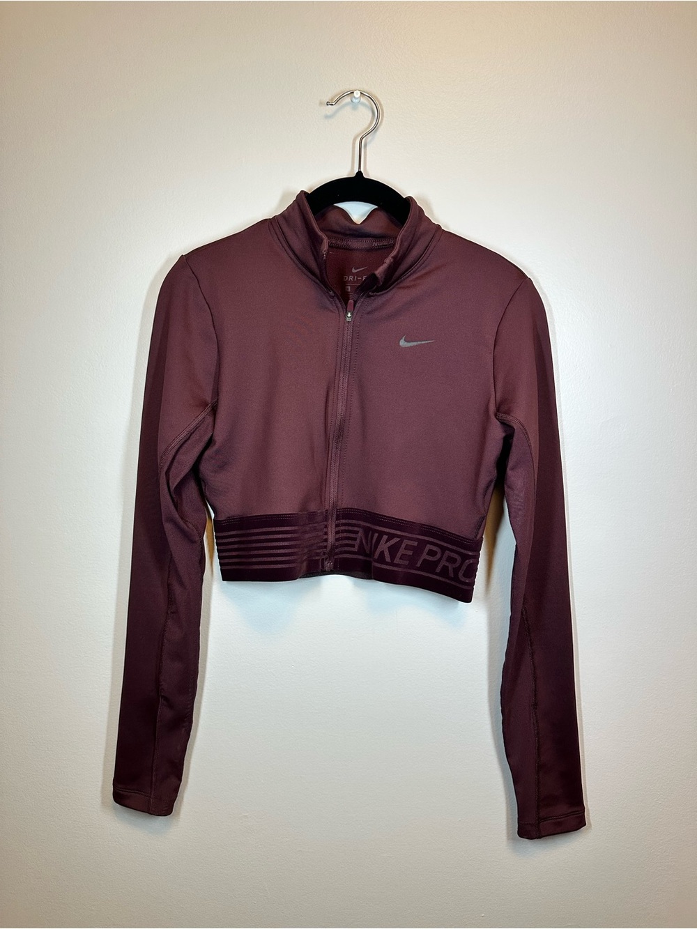 Nike Dri-FIT Cropped Zip Jacket in Burgundy